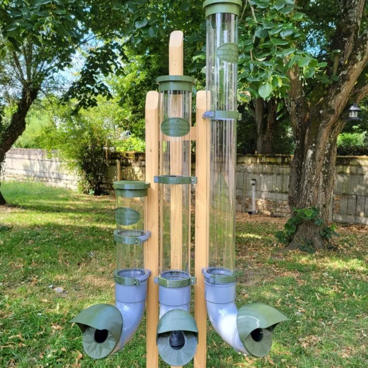 Mangeoire poule en plastique vert tube transparent Altéa 7kg - Evena
